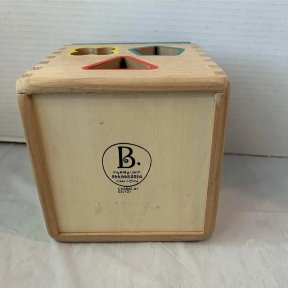 B. Toys Wooden Shape Sorting Cube Toy with 9 Shapes